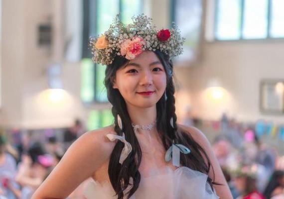 Yuan Tan in a flower crown. 